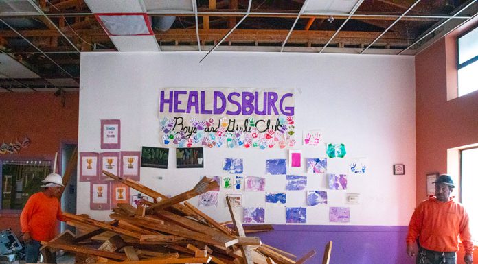 Clearing space for the future Boys & Girls Clubhouse Interior of Boys & Girls Club during demolition