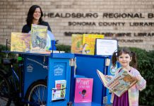 Library’s ‘BiblioBike’ gets national recognition young reader at Healdsburg biblio-bike