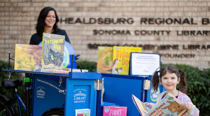 young reader at Healdsburg biblio-bike