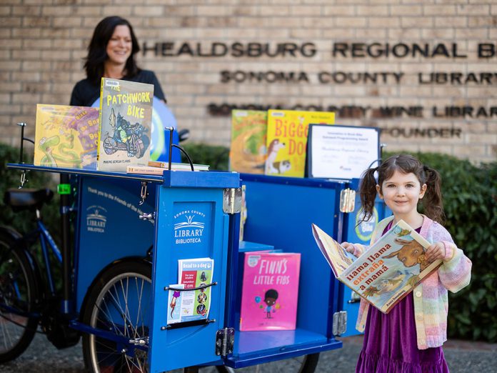 young reader at Healdsburg biblio-bike