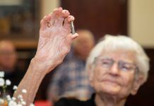 Veterans bring out their best Alice Beck Darrow, 106 years old, holds aloft a silver bullet.