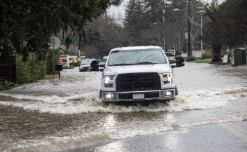 truck on north street in flood
