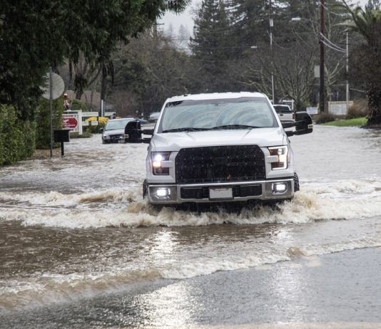 New Year’s Storms, 2026 truck on north street in flood