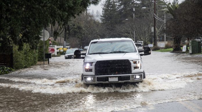 truck on north street in flood