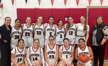 The 2025-26 Healdsburg High girls basketball team and coaches.