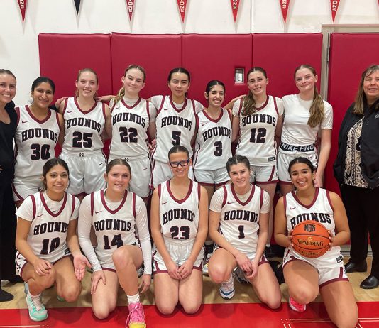 The 2025-26 Healdsburg High girls basketball team and coaches.