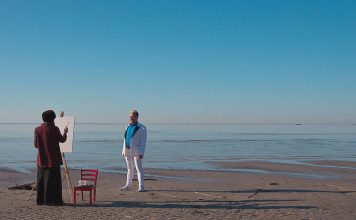 Artist and subject at the sea