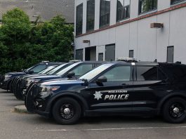 Police cars in a parking lot