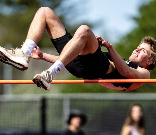 Jasper clears the bar in high jump Teague Jasper clears 6"- 7".